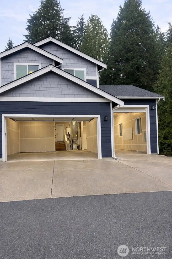 This incredible home has a double bay garage with clearance for an RV
