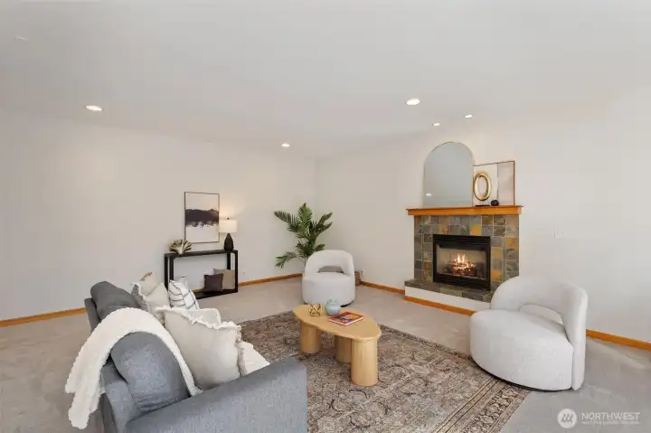 The family room features tall ceilings and dimmable lighting, creating a bright yet customizable atmosphere.