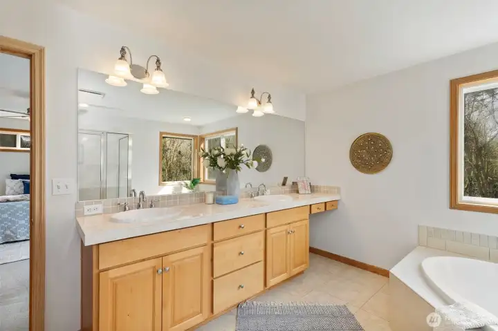 Primary en suite bathroom featuring a dual-sink vanity for convenience and functionality.