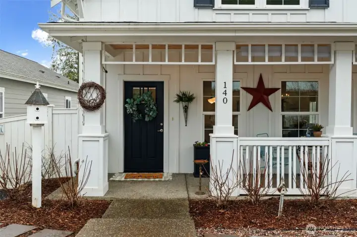 Welcoming front porch and classic cottage architecture