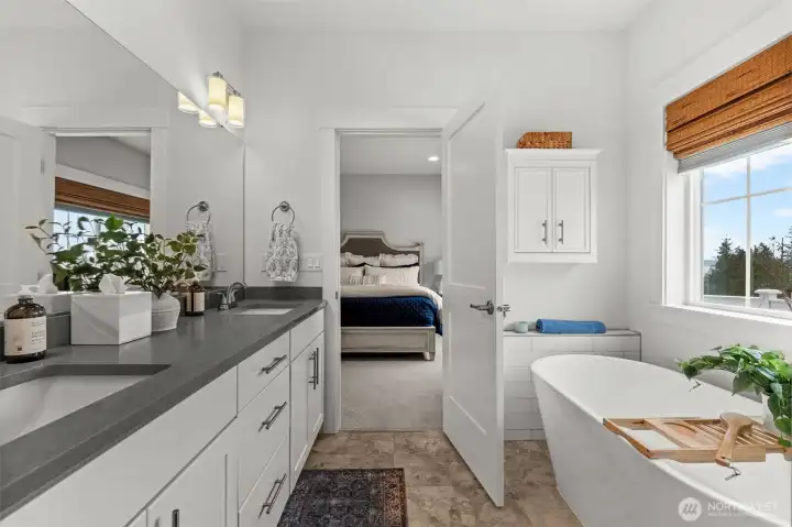 Double vanity and soaking tub in primary bath