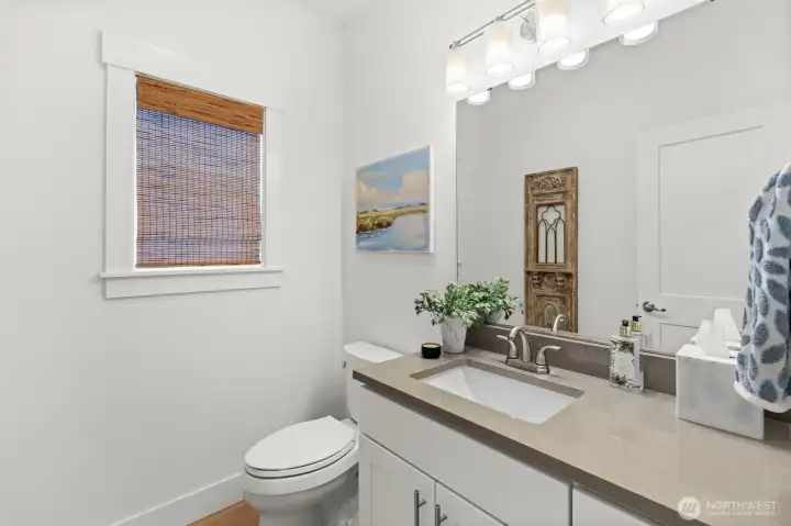 Upstairs bath with clean, bright finishes