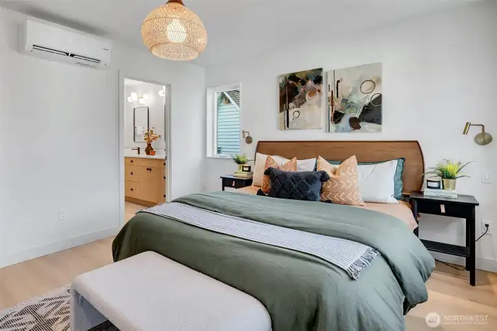 Brand-new primary suite featuring in room AC, abundant natural light & sleek bathroom.