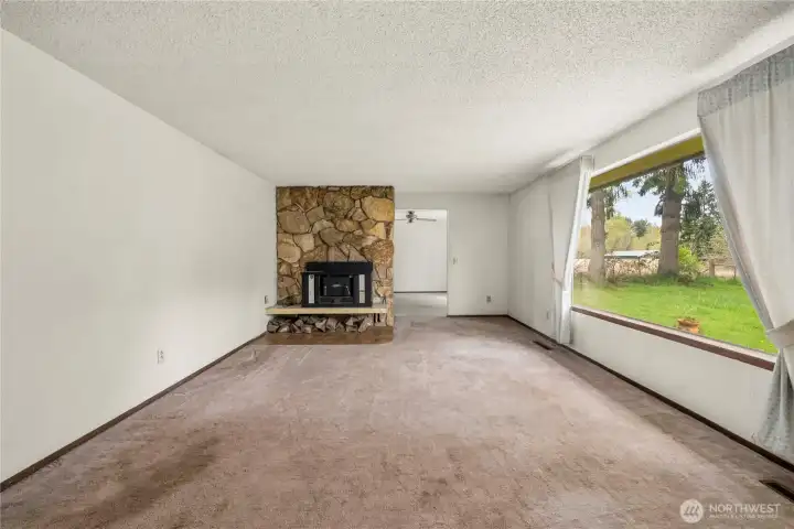 HUGE picture window lets the light and beautiful views of nature inside!