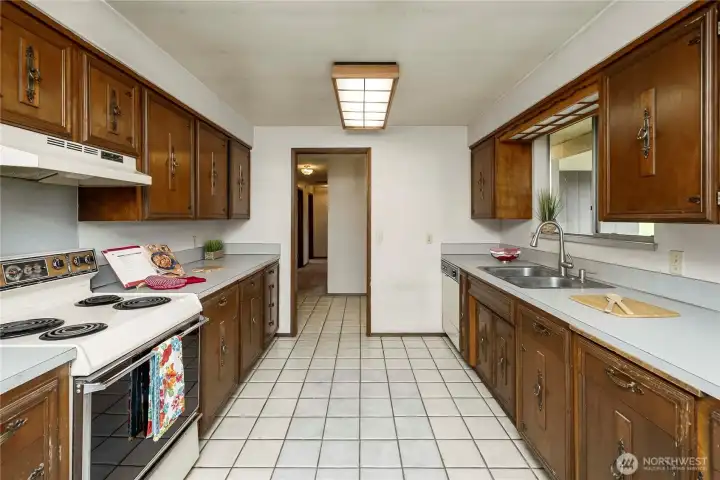 Looking toward the front door from the far end of the kitchen.