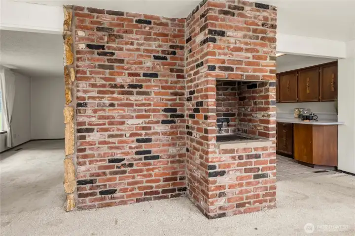 Around the corner from the kitchen is the built-in BBQ.