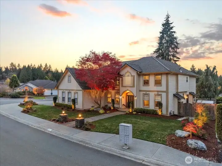 Fall photo with beautiful maple tree in bloom. This corner lot is just shy of 14,000 sq ft.