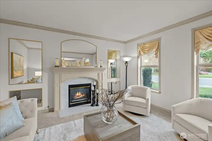 Formal living room with gas fireplace.