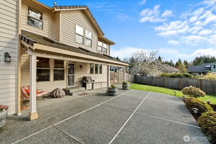 The expansive patio and covered area are perfect for entertaining.