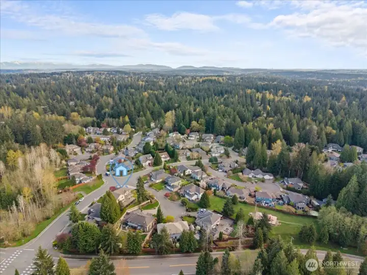 Overhead view shows the playgound area accessed by a trail in the cul-de-sac.