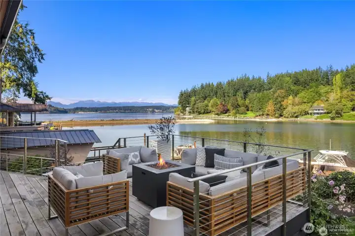 Multiple seating areas are ideal for watching glorious sunsets with an Olympic Mountain backdrop