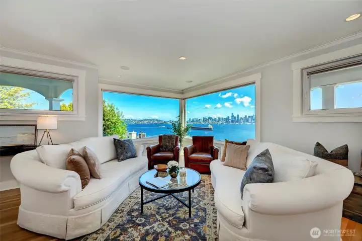 Panoramic views of Puget Sound, Seattle skyline, Space Needle and Cascade Mountains.