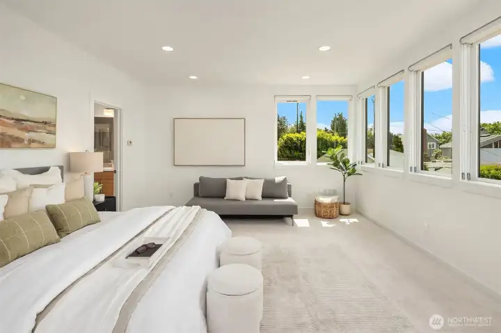Primary bedroom offers soaring west-facing views!