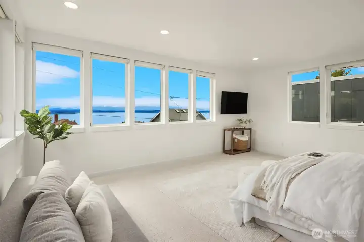 Primary bedroom offers soaring west-facing views!
