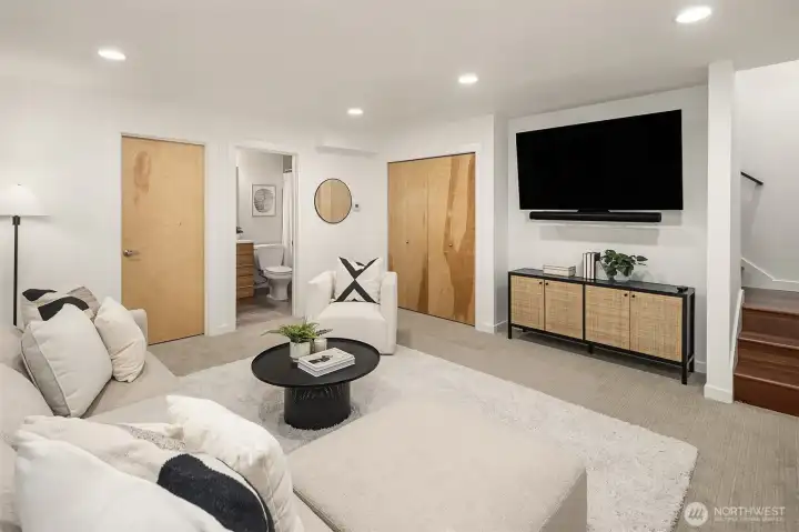 Lower level works well for guests, media, and workout space.