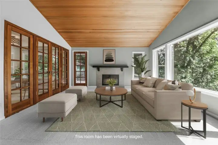 The cedar ceiling is another classic northwest design detail. It anchors the room, and provides a wonderfull indoor-outdoor connection.