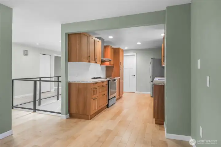 Beautiful cabinetry, quartz countertops, stainless steel appliances, and an induction cooktop -- what's not to love?