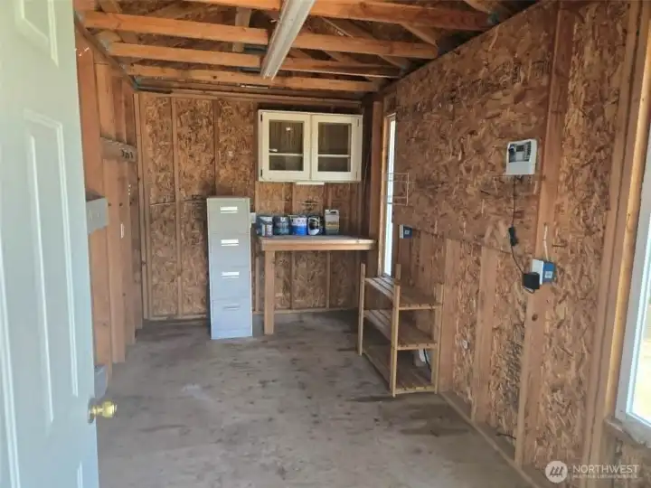 Shed features outlets, storage, windows and sprinkler system controls Shed features outlets, storage, windows and sprinkler system controls