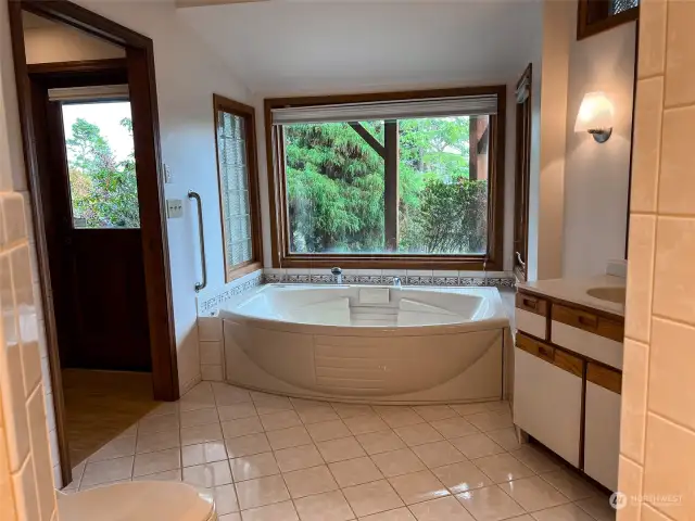 and a jetted tub with views.  You may want to trim some of your bushes.