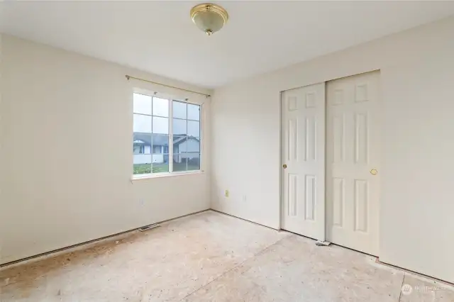 Bedroom #3, window facing street.