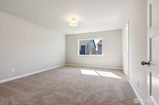 **Photos of simlar floorplan in another community. Features and specs will vary**