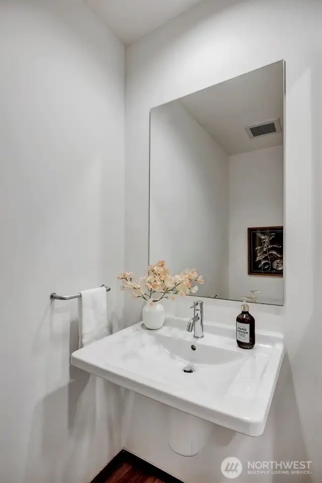 Additionally, there is a powder room for guests.
