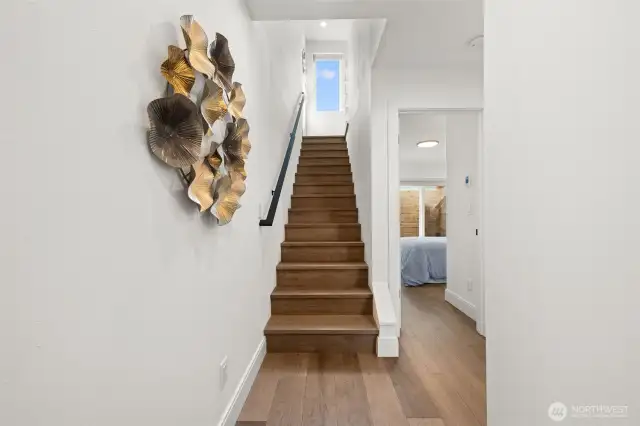Welcoming Entry Way, with beautiful engineered hardwood floors, and lots of natural light. Inviting and peaceful