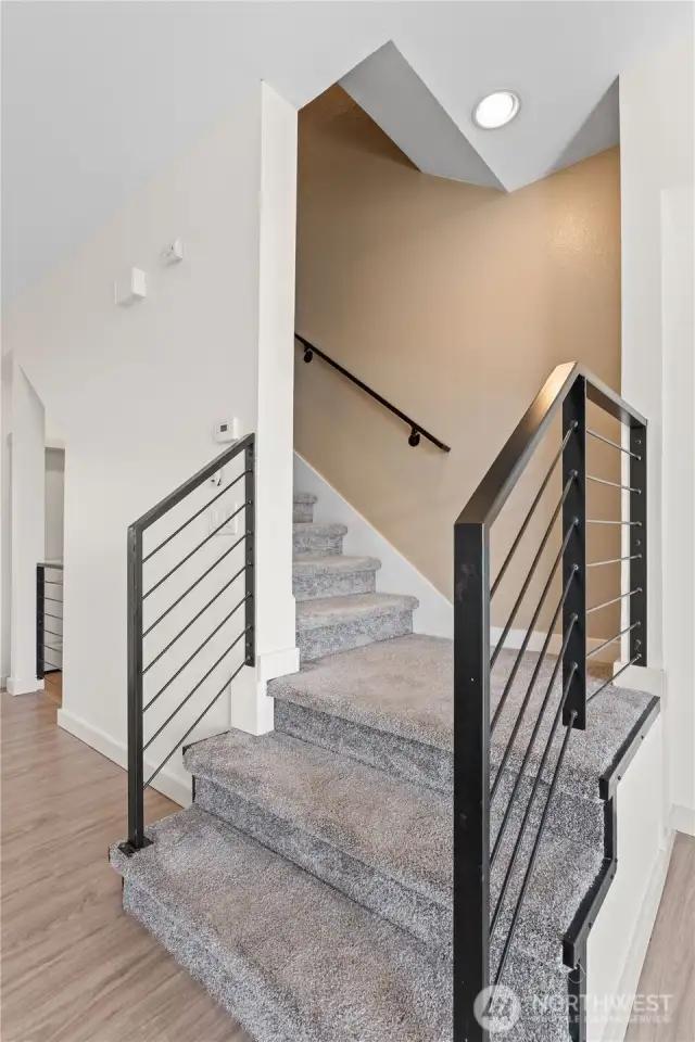 Upgraded modern black stair railing