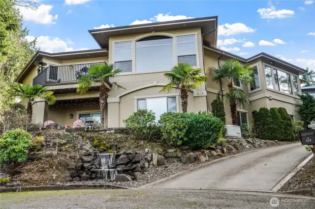 Beautiful home with waterfall feature and a Sound View too....