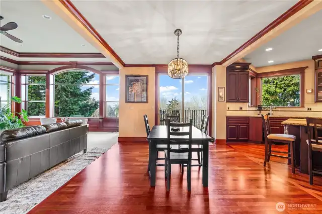 Dining between kitchen and great room with access to deck for morning coffee and/or evening wine... with a view