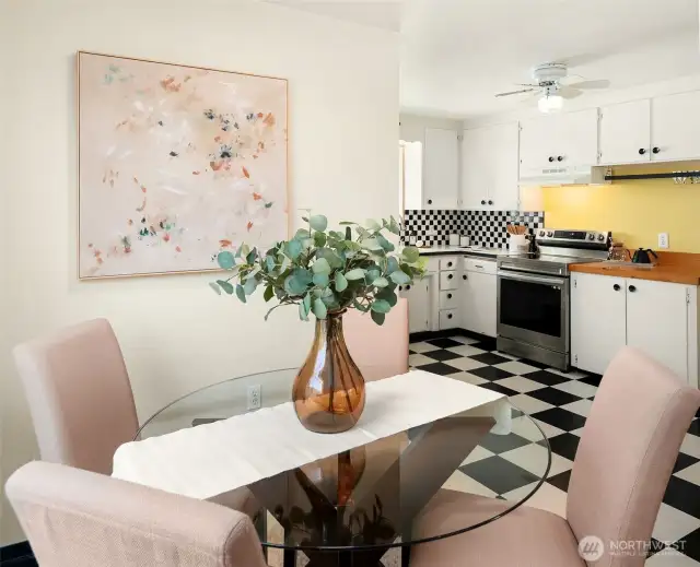Tucked right off the kitchen, this cozy dining space is perfect for everything from morning coffee to casual meals. A fun spot where meals are enjoyed and memories are made—small but full of charm!