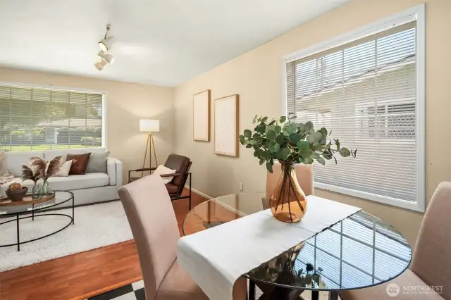 Perfectly positioned between the kitchen and living room, this dining space is bathed in warm, afternoon light thanks to a west-facing window. Whether it’s for dinner or casual hangouts, it’s the ideal spot to soak up the sun while enjoying a meal.