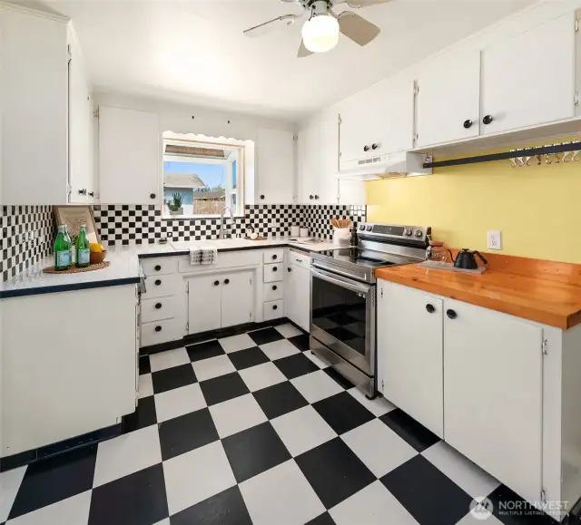 The kitchen comes with a bonus—a garden window that gives you a perfect view of the backyard. Grow some herbs, admire your flowers, or just enjoy the light while you whip up your next meal. Functionality meets charm!