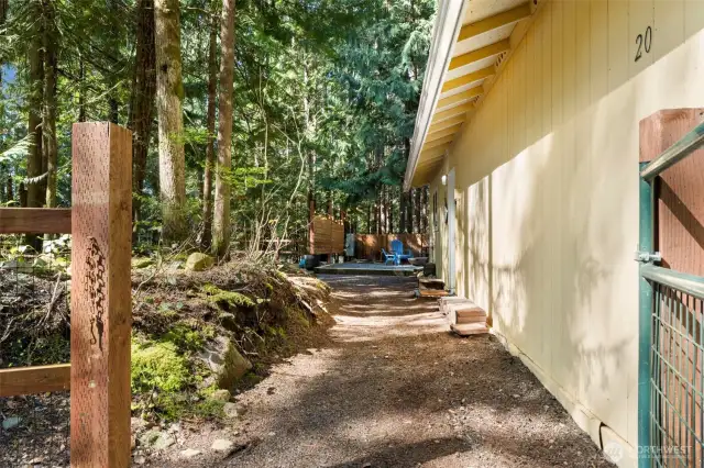 Large front and side yards are totally enclosed.