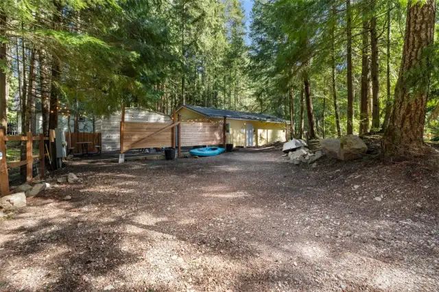 Your cottage in the trees is perfect for weekend getaways... or full-time living.  Easily rentable with a solid history.