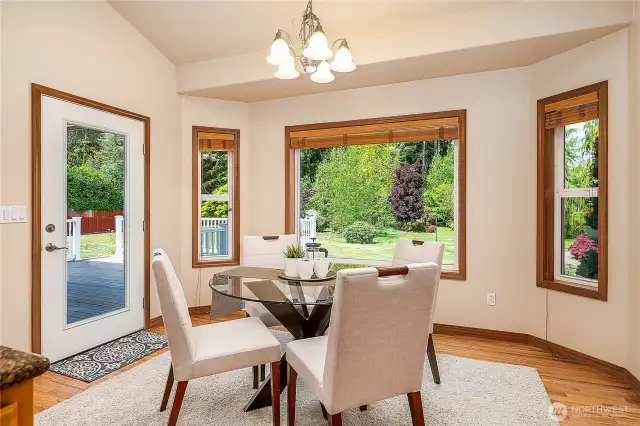 Breakfast nook has access to the deck and lovely views of the backyard and gazebo.