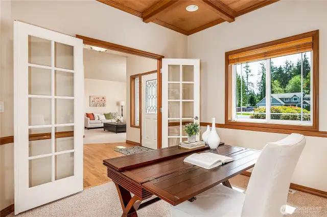 Den/Office with French doors that lead to the front entrance.
