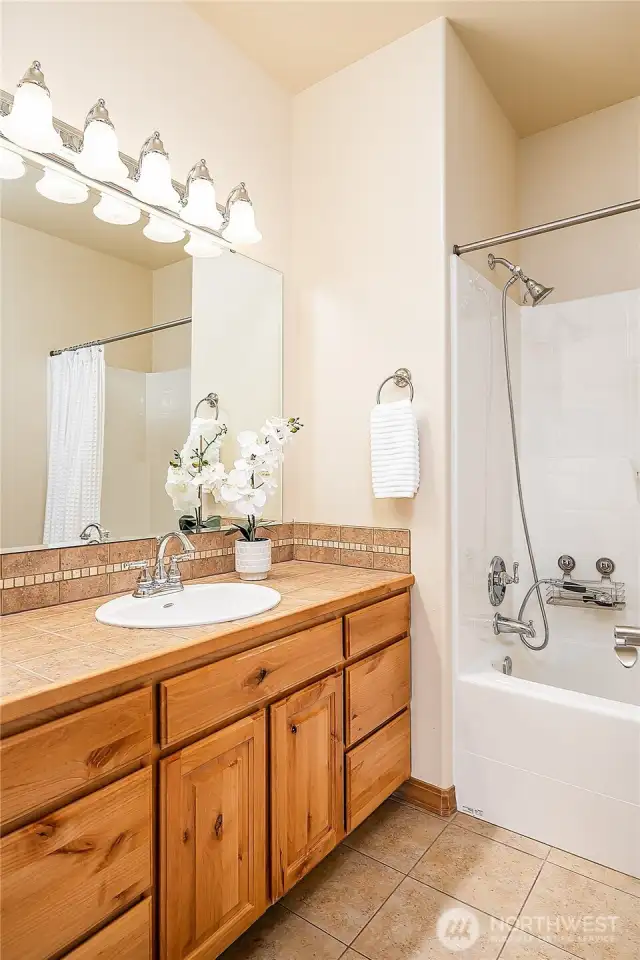 Guest Bathroom with tub/shower combo.