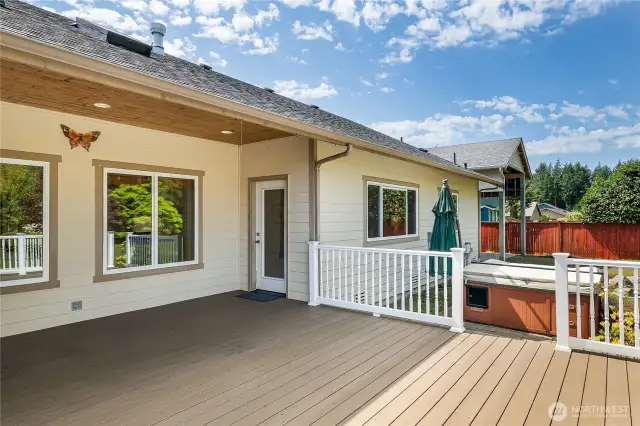 Entertain on the deck and relax in the large hot tub. Life is good!