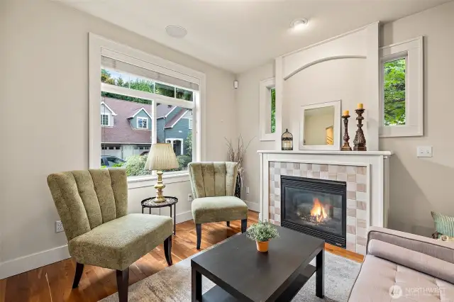 Formal living room with gas fireplace.