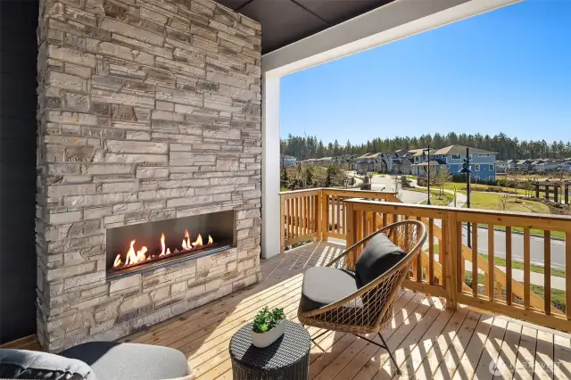 Covered patio with exterior fireplace - gorgeous southwest facing  Photos for illustrative purposes