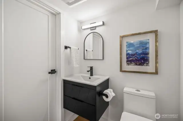 Brand new half bath in fully finished basement