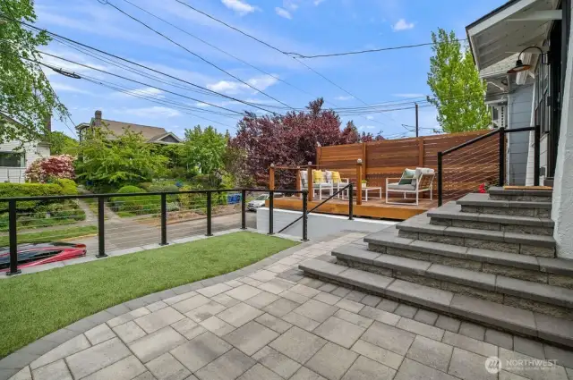 New, gorgeous landscaping creating an inviting entrance