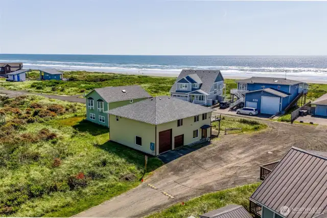 Ariel view of residence and proximity to the ocean.