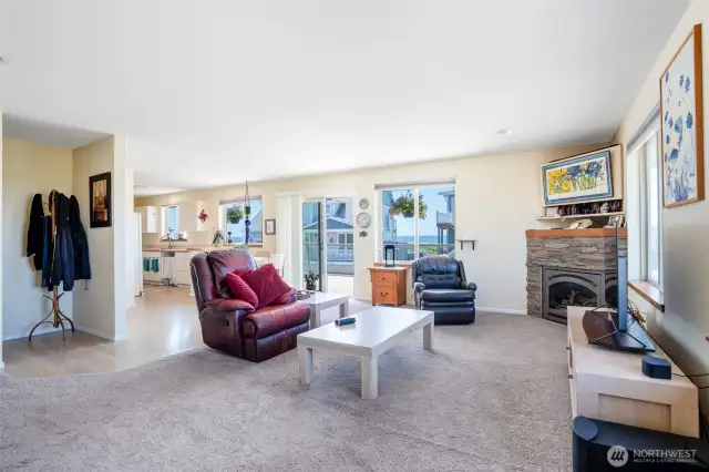 View of living space and sliding glass door out to XL deck with Ocean Views!