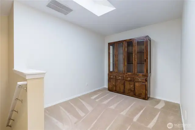 Loft flex room has a skylight for great natural light. Perfect space for crafts, home office, exercise room, playroom, etc.