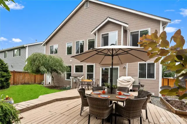 Outdoor living space is ideal for unwinding and dining al fresco.