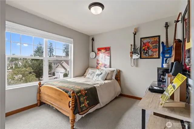 This versatile room is ideal as a guest room, secondary bedroom, or private study.