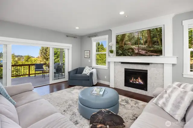 Cozy up in front of the fireplace, watch a movie or entertain on the covered deck.