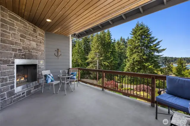 The Great Room level covered deck has a sweet propane fireplace for all season outdoor entertaining.